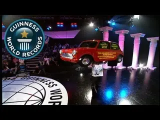 Levantamiento de coche sobre la cabeza (Récord Guinness)