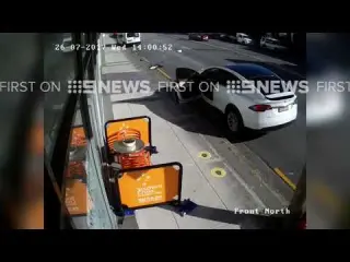 Tesla Model X door torn off by passing truck
