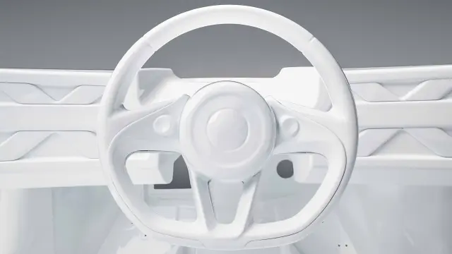 Un detalle de la pieza del salpicadero modelada en blanco.