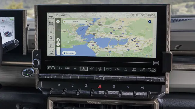 Close-up of the 2024 GMC HUMMER EV SUV’s 13.4-inch infotainment display featuring Google built-in compatibility with Google Maps.